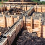 House building construction site, foundation and cement pouring